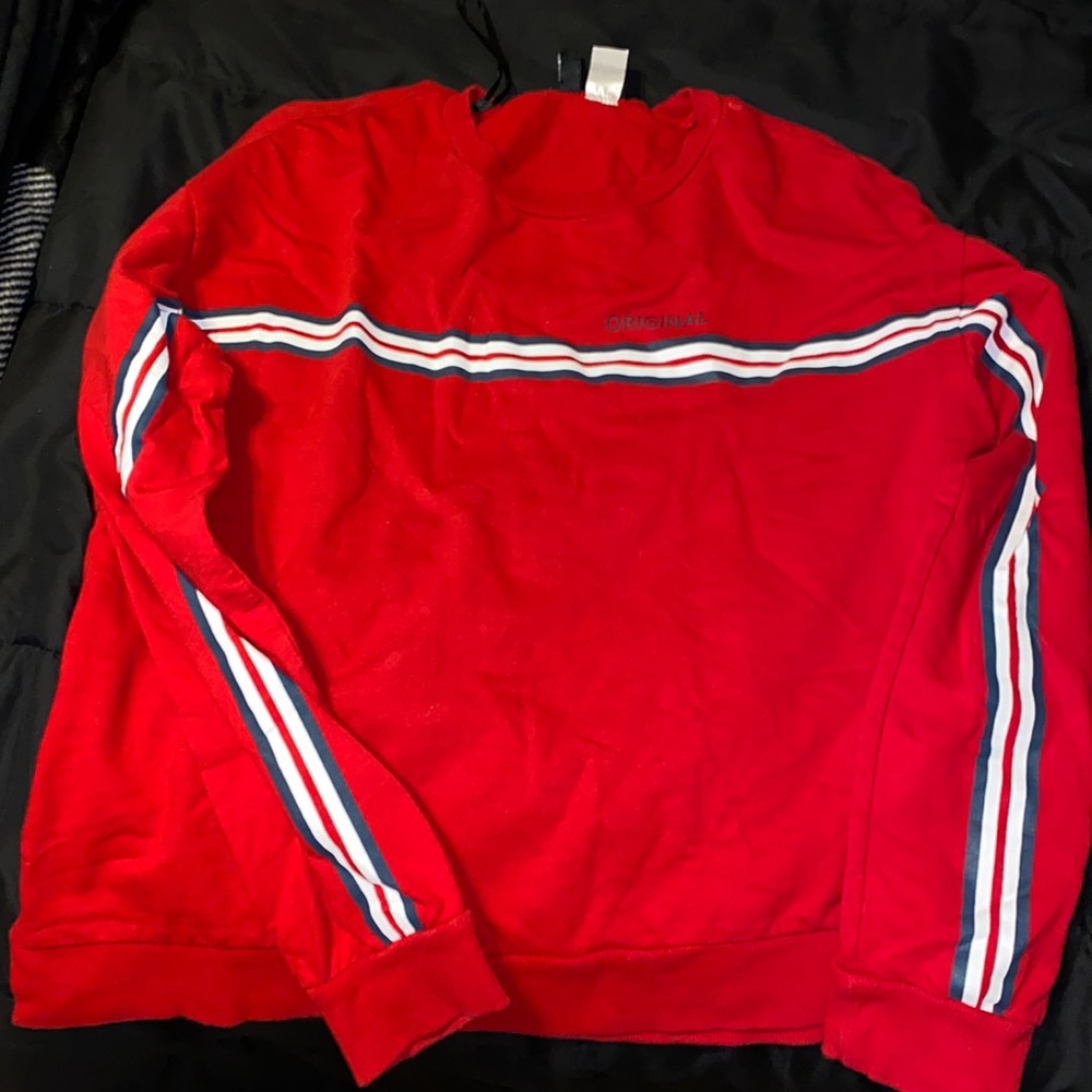 Red navy blue and white sweater